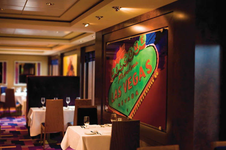 Modern interiors with purple, blue and orange hues, as well as a selection of light and heavy dishes, await guests at Indigo, Norwegian Pearl's main dining room.