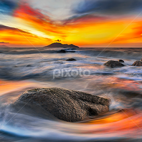 Rock and sunset clouds by Dany Fachry - Landscapes Beaches