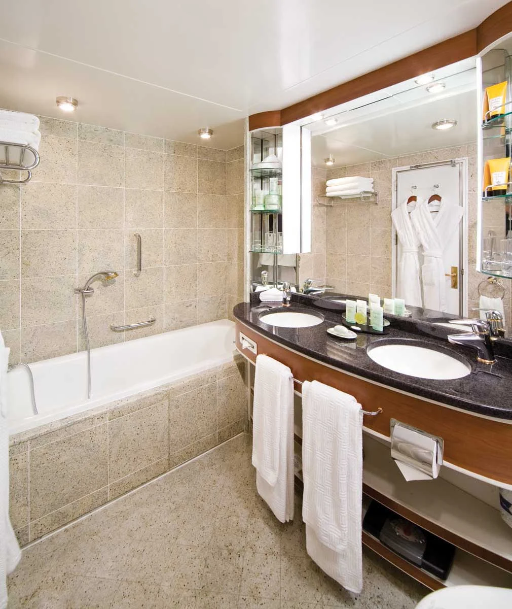 Silversea_Veranda_Suite_bathroom - Press your toes against the fine marble in the Veranda Suite bathroom aboard Silver Shadow, outfitted with a full size bath and separate tub.