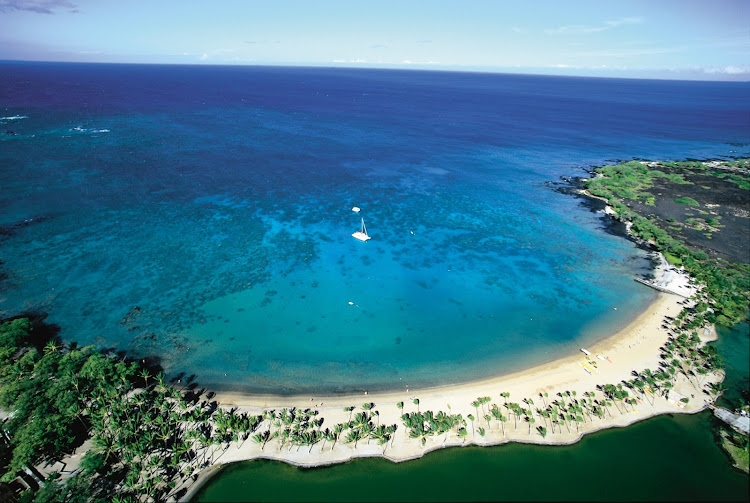 Aerial view of Anaehoomalu Bay, a popular gold-sand beach fronting the Outrigger Waikoloa Beach Resort on the Big Island's Kona-Kohala Coast.
 
