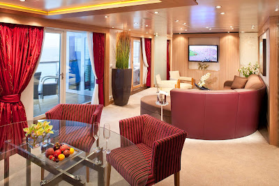 The exceptional Wintergarden Suite has a private glassed-in Solarium with a soaking tub and a lounging bed. It also features a veranda that's bowed out, giving wonderful views of the side of the ship. 