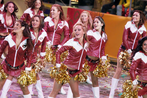 Cheerleaders from the San Francisco 49ers — the Gold Rush — participate in the Chinese New Year Parade in Hong Kong.