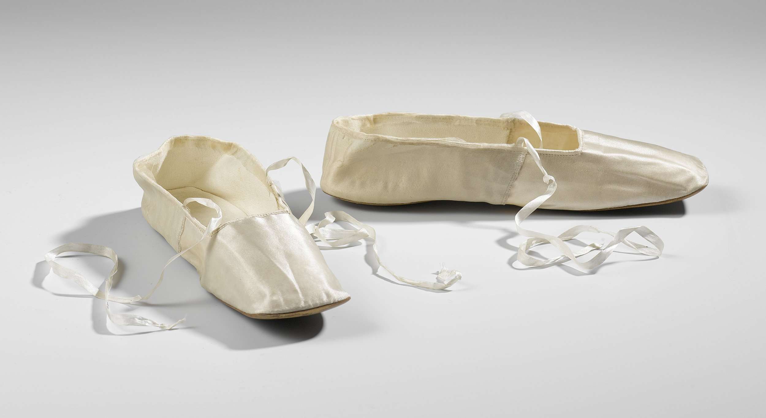 Pair of shoes with ribbon laces