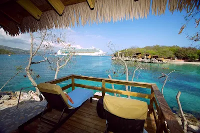 Freedom of the Seas cruises off the shores of Labadee, a beautiful private resort on the northern coast of Haiti.