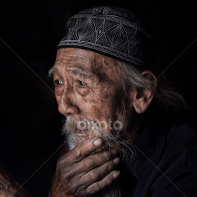 Ki Soeripto:Stroked His Beard by Franciscus Satriya Wicaksana - People Portraits of Men