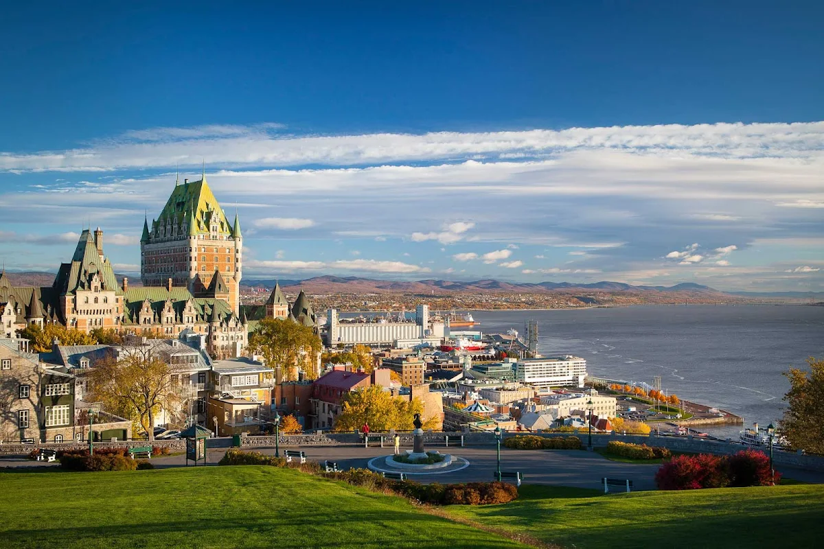 Fairmont-Le-Chateau-Frontenac-Quebec-City - The Fairmont Le Chateau Frontenac towers over neighboring buildings in Quebec City.  It was designated a National Historic Site of Canada in 1980.