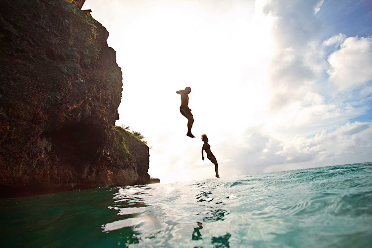 For a rush of adrenaline, try cliff jumping into the crystal clear waters at Playa  Forti, Curacao.