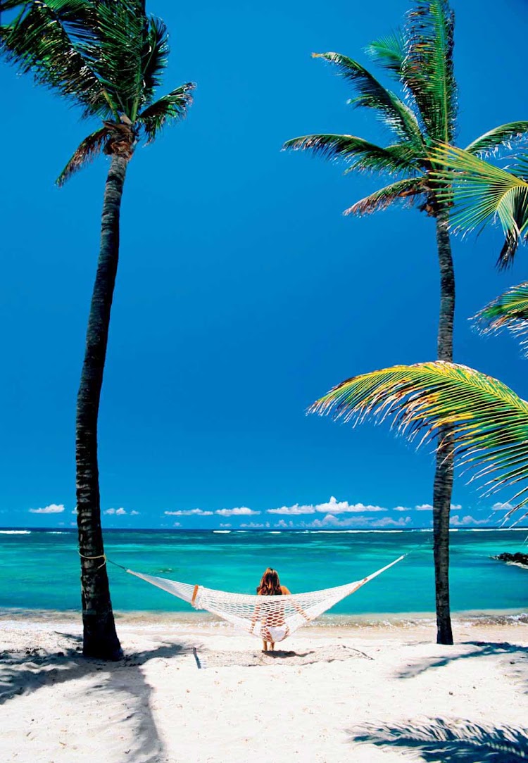 Unplug and pull up a hammock during a day on a tropical beach during your Windstar cruise.