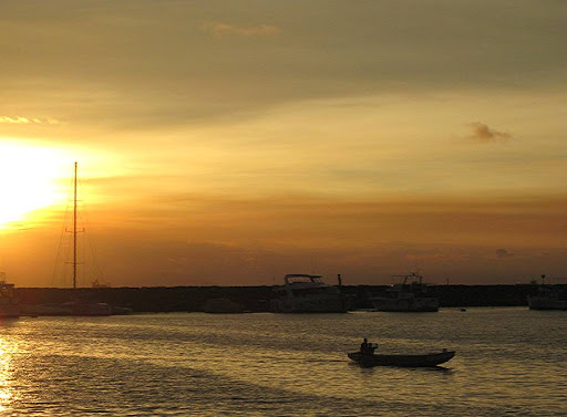 sunset across the breakwater of the Manila Yacht Club