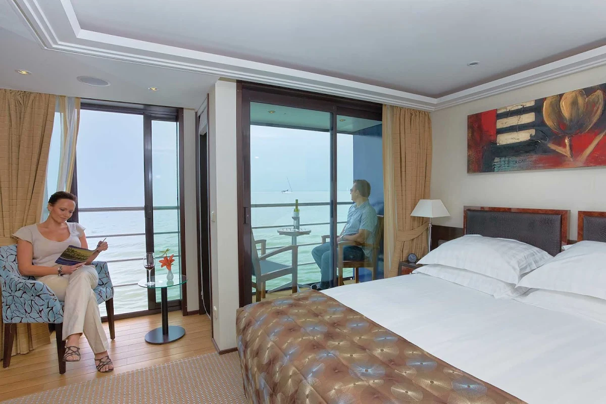 AmaBella-Stateroom-Twin-Balcony - Relax and enjoy the sights of your European cruise from the comfort of a twin balcony suite aboard AmaBella. 