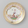 Plate with a man, three children and birds