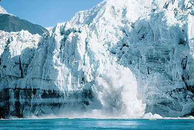 Ice calving (where chunks of glacier fall into the water) in Alaska.