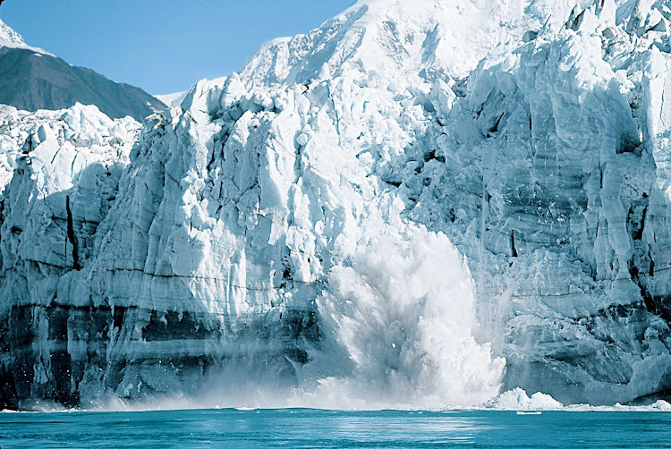 Ice calving (where chunks of glacier fall into the water) in Alaska.