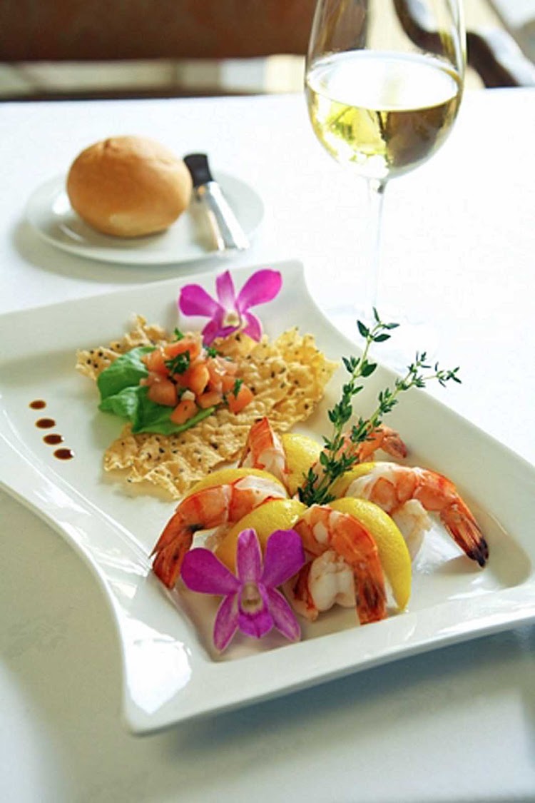 A shrimp dish with a glass of wine makes for a nice lunch at an Anguilla restaurant. 
