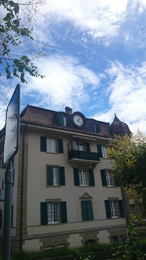 House With a Huge Clock on the Roof