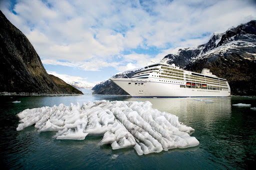 Seven Seas Mariner navigates through a channel carved by glaciers during a summer sailing to Alaska.