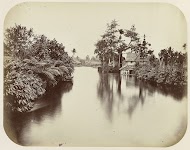 Huizen aan de Tondano te Manado