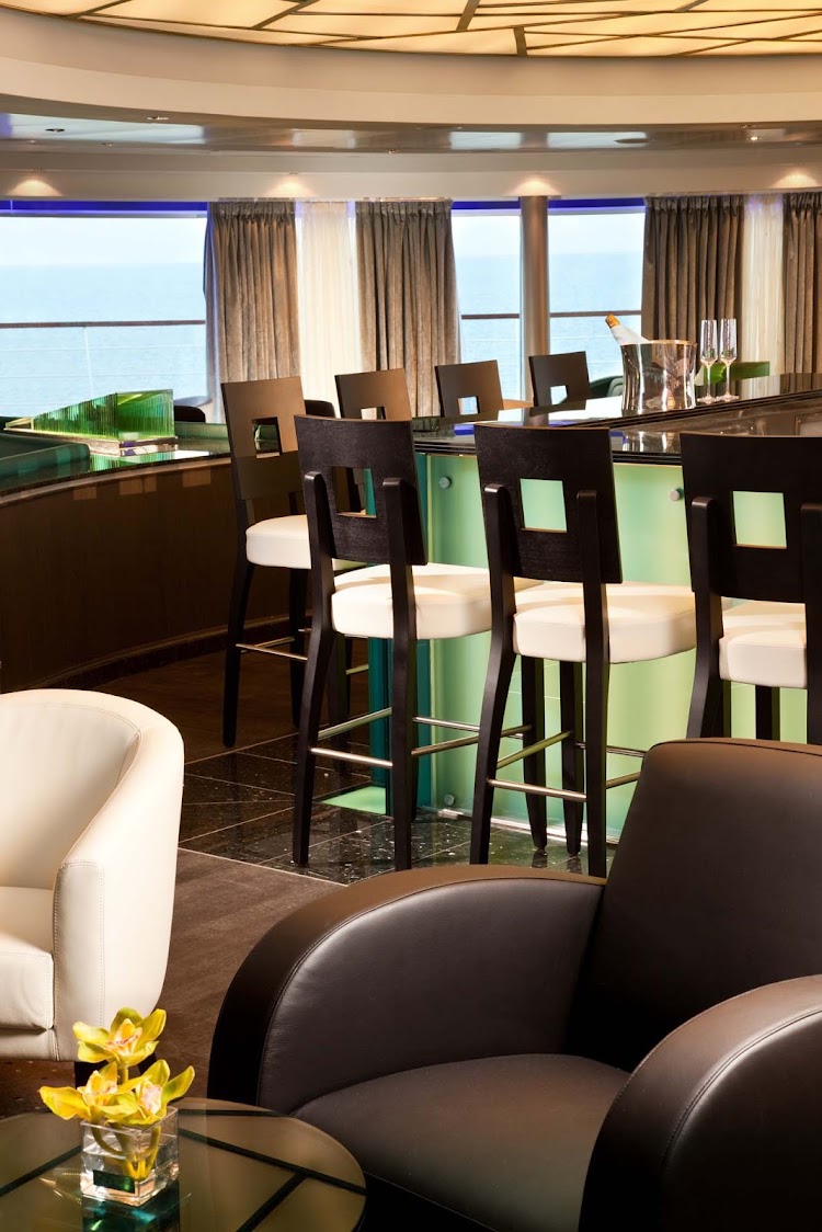 Panoramic views greet guests as they gather for early morning risers' coffee and tea in the Observation Bar on Seabourn Odyssey.
