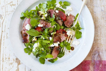 Lamb tagliata with watercress & tomatoes