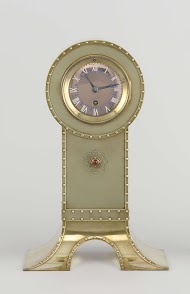 Mantle clock with two candelabra