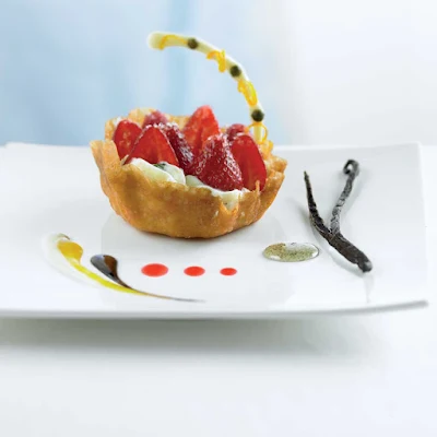 You'll be tempted by the crisp gingersnap basket filled with strawberries and mint cream dessert served in the Celebrity Cruises's Blu restaurant.
