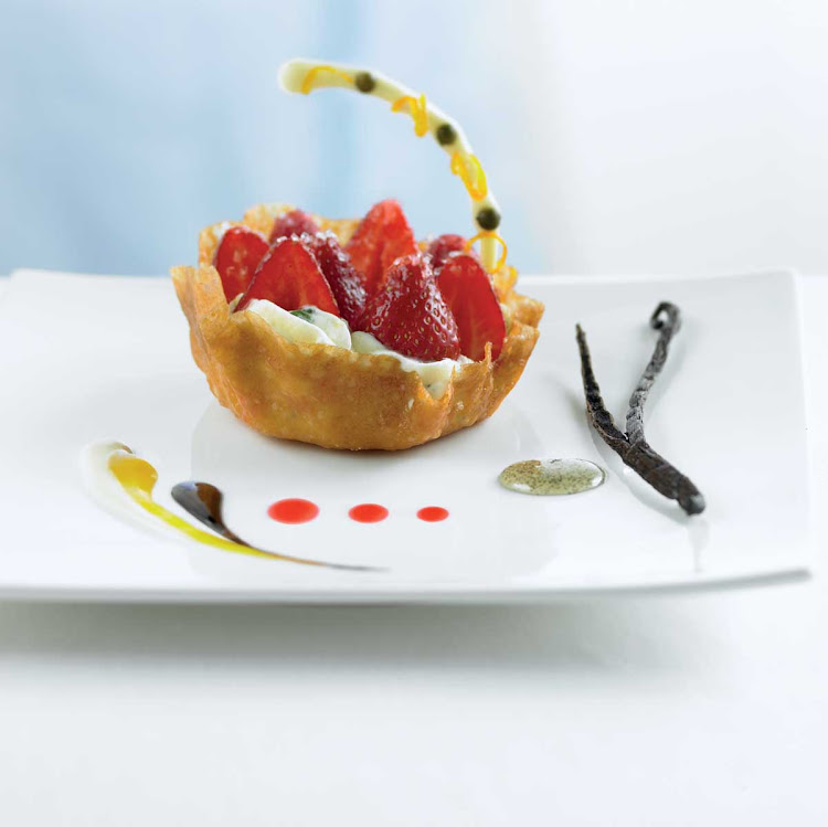You'll be tempted by the crisp gingersnap basket filled with strawberries and mint cream dessert served in the Celebrity Cruises's Blu restaurant.
