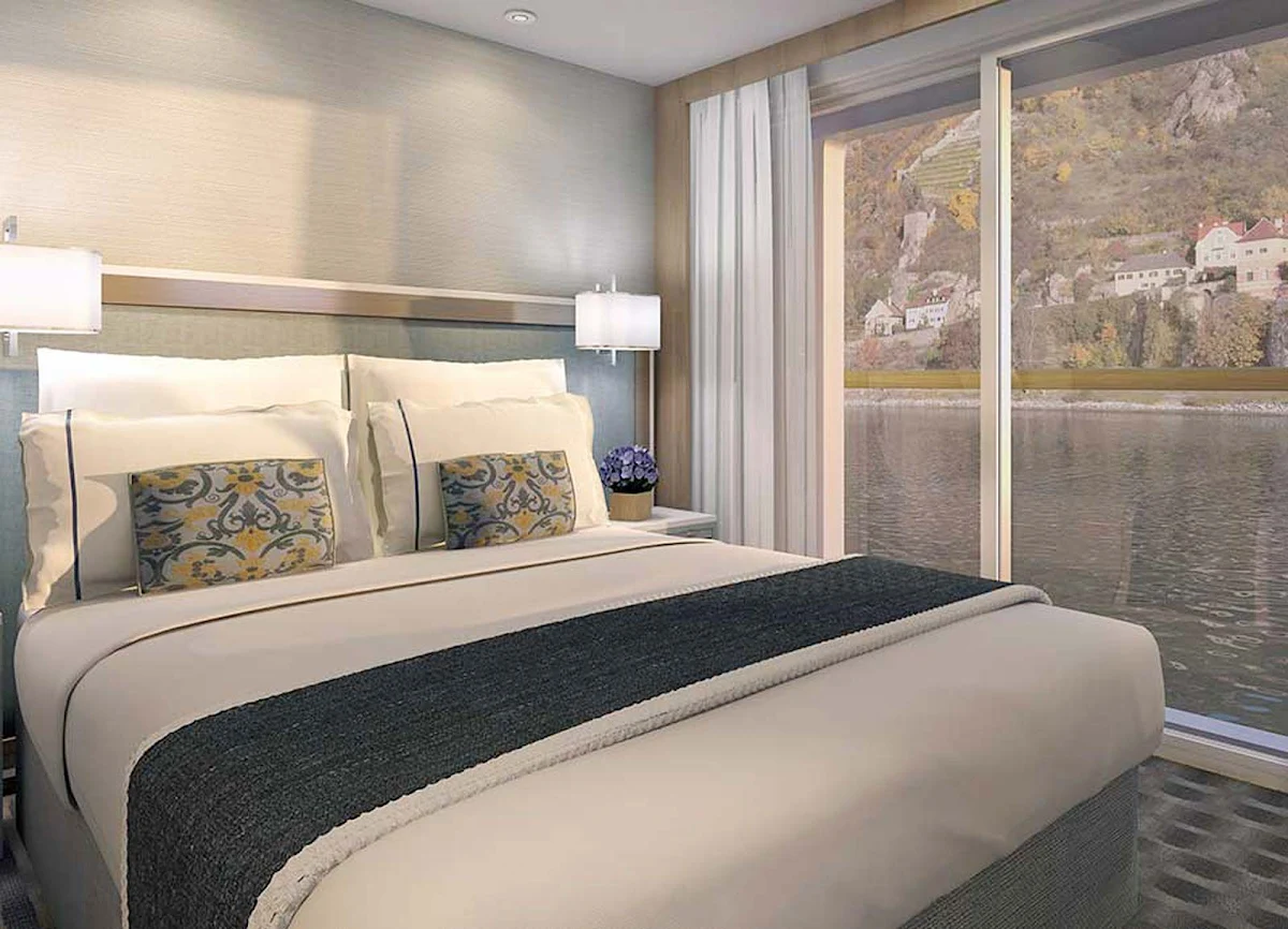 Viking-Longship-Veranda-Suite-02_95 - Never miss a moment of your cruise with uninterrupted views and a private balcony in the Veranda Suite of a Viking Longship. 