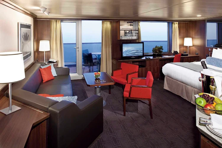 Neptune Suite, also called a Deluxe Veranda Suite, aboard Nieuw Amsterdam gets you 506 to 590 square feed including a private veranda, king bed (or two singles), bathroom with dual sink vanity, full-size whirlpool bath, sitting area with sofa, priority boarding for ports of call, priority dining and seating and special amenities. (Be sure to ask Cruiseable's travel specialists for details about the small differences between Neptune Suites and Signature Suites.)