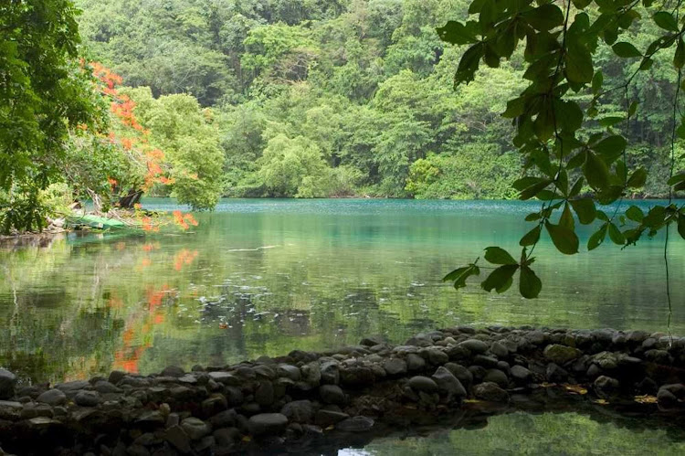 Blue Lagoon in Port Antonio, Jamaica, is  a popular destination for families and honeymooners. It owes its color to its depth of 200 feet.