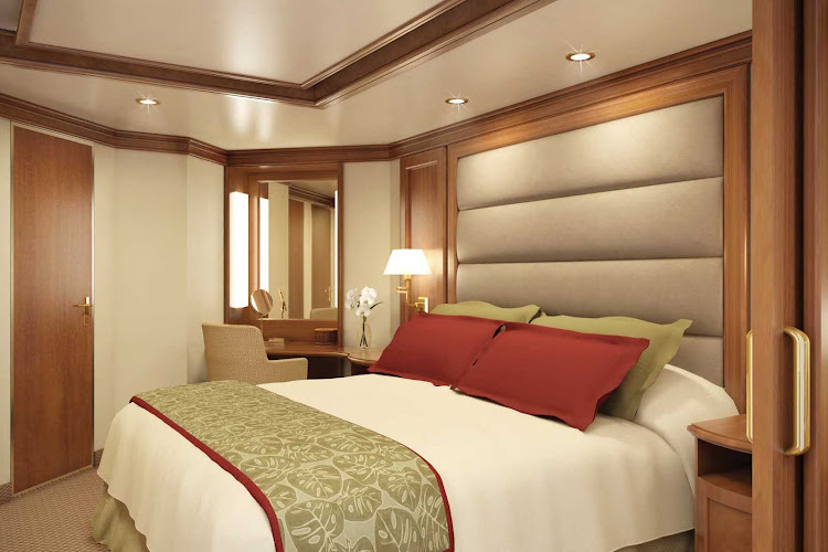 The Silver Suite features separate living and dining rooms along with two French balconies. Located at midship, it's a favorite among cruisers aboard Silver Spirit.