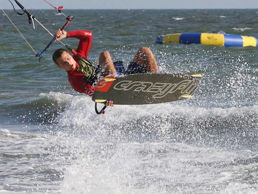 kitesurf-air-Cozumel - An experienced kitesurfer catches air off the coast of Cozumel.