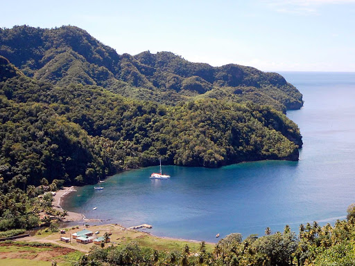 Cumberland-Bay-St-Vincent-Grenadines - Cumberland Bay, bisected by a fresh-water stream and framed by lush palm trees, on St. Vincent and the Grenadines.