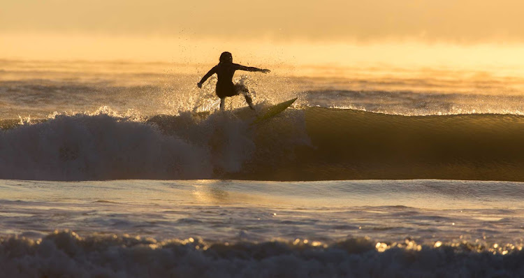 Surfing on Thanksgiving Cocoa Beach, Florida.