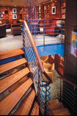 Words, Celebrity Millennium's two-story library, features a spiral staircase, glass walls and deep armchairs. It's the ideal place to snuggle up with a good read.