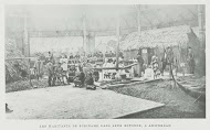 Groepsportret van Surinamers tentoongesteld op de Koloniale tentoonstelling, Amsterdam 1883