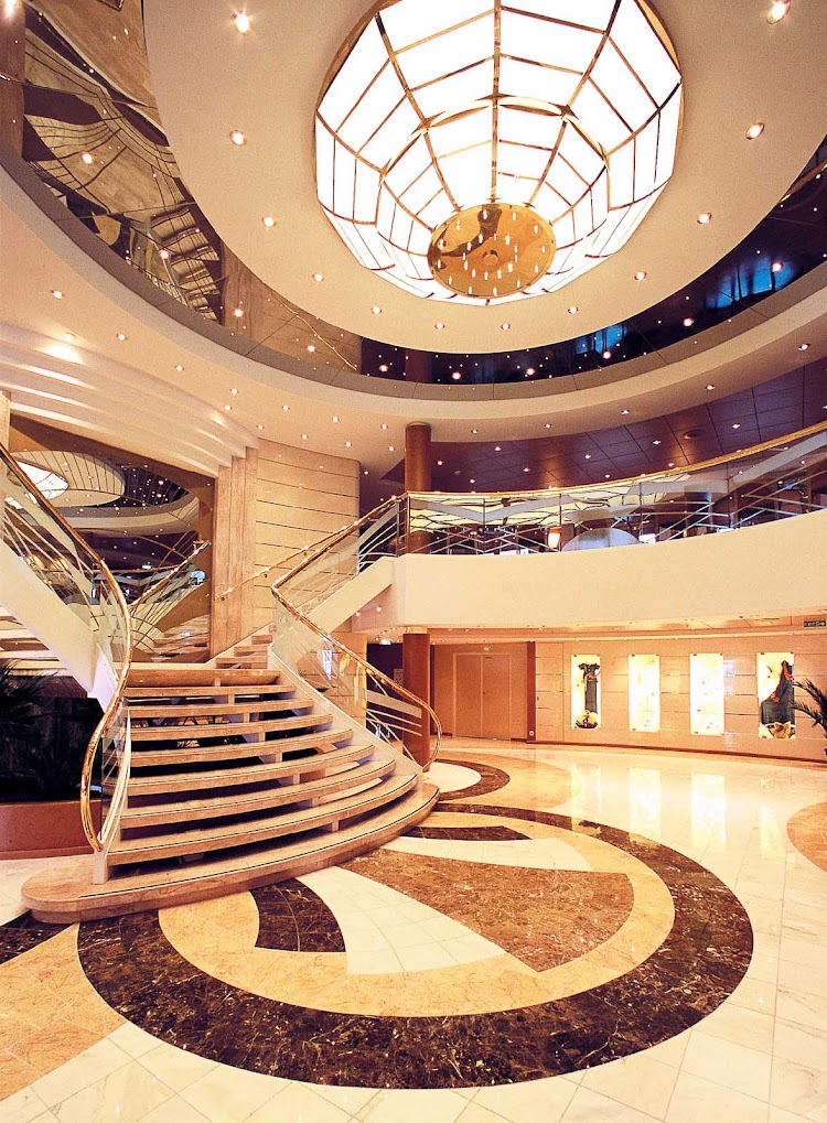 The understated, elegant atrium on MSC Opera, where the reception area is the first stop on your voyage to your chosen destination.