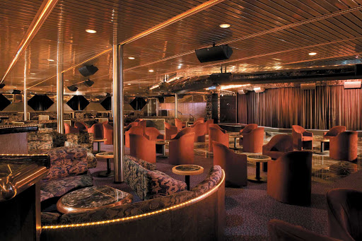 When cruising on Carnival Ecstasy, plan an evening of laughs and karaoke at the Starlight Lounge.