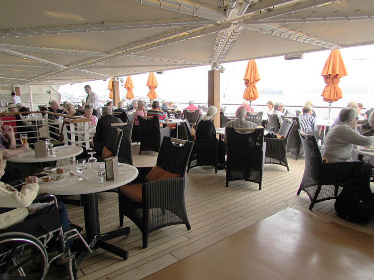 The deck scene outside Terrace Café aboard Oceania Regatta.