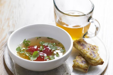 Tomato consommé with Lancashire cheese on toast