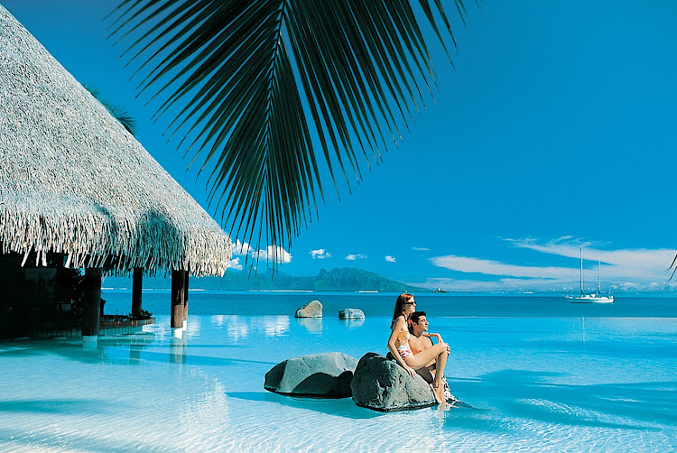 Step into a magazine cover when the Paul Gauguin takes you to the InterContinental Resort Tahiti's sublime infinity pool.