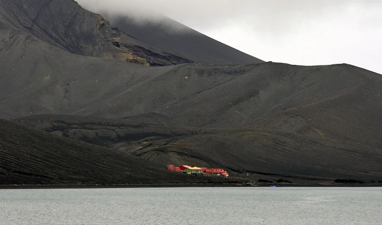 Deception Island, a bleak volcanic caldera, offers one of the safest harbors in Antarctica. It was once a whaling station, and it was said that the entire harbor was for years clogged with the carcasses of whales. A pair of volcanic explosions in the 1960s destroyed most of the man-made structures. Today, Argentina maintains a small but colorful base here.
