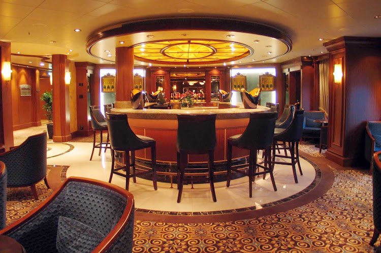 Sip champagne from flawless Waterford crystal flutes at the Veuve Clicquot Champagne Bar aboard Queen Mary 2.