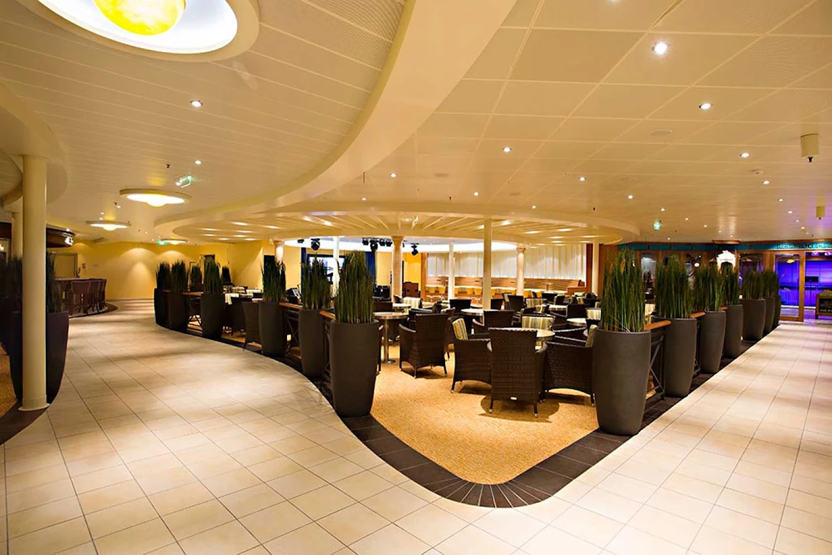 Carnival-Sunshine-Ocean-Plaza - Dance the night away with the sea as your backdrop in the Ocean Plaza aboard Carnival Sunshine. 