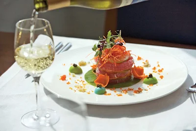 Cap off your gourmet dinner with a glass of sparkling wine, whether inside your suite or in a dining room on your Scenic Cruises sailing. 
