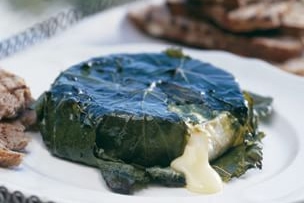 Grape Leaf-Wrapped Camembert with Pesto