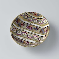 Saucer with ornamental borders