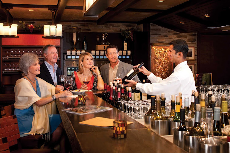 Share a bottle, or take a class, at Freedom of the Seas' Vintages wine bar.