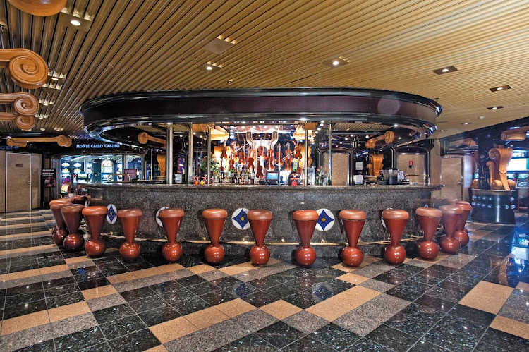 Stop by the Violins Bar for cool drinks, live music and ocean views on your next Carnival Inspiration cruise to Mexico. 