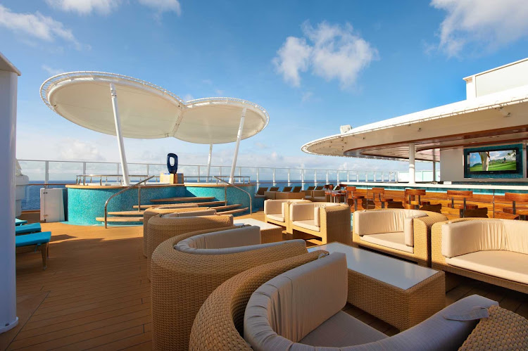 Private access to Norwegian Breakaway's Vibe Beach Club lets you enjoy a gigantic hot tub, ocean views, chaise lounges and cabanas.