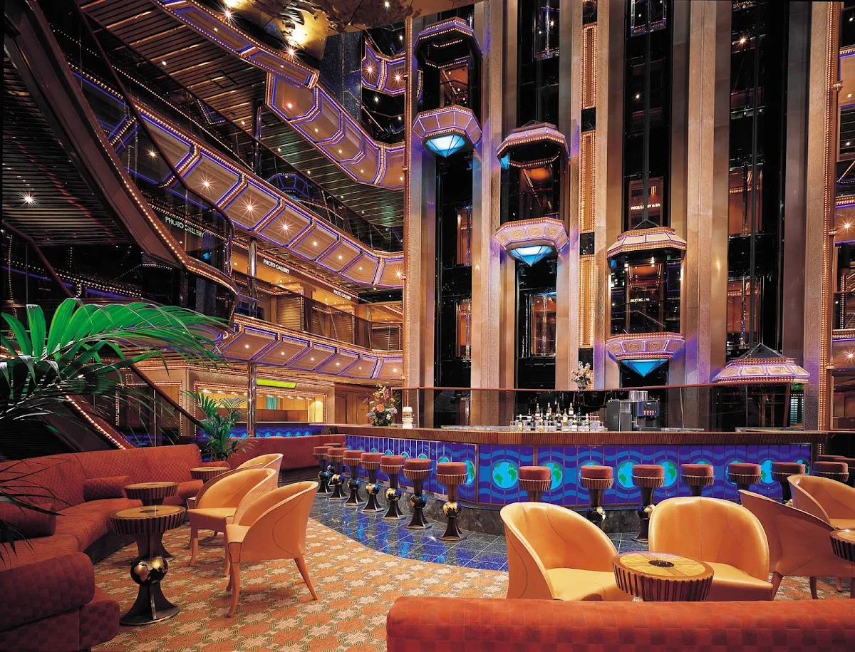 Carnival-Triumph-Capitol-Bar - Guests revel in Carnival Sunrise's lively vibe at the Capitol Bar.